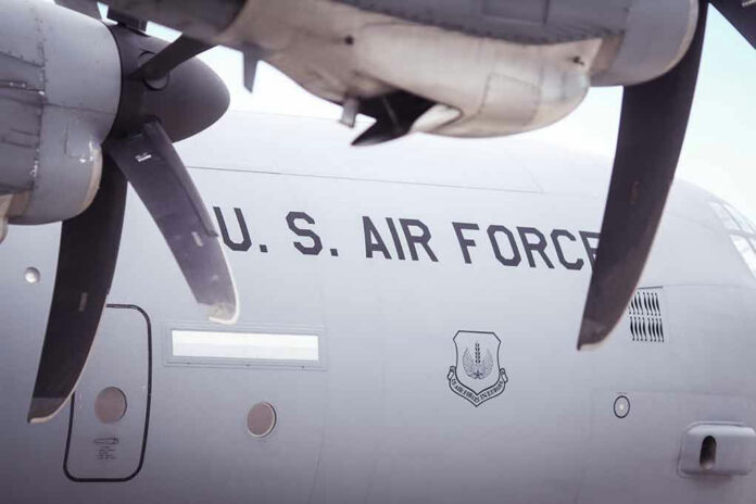 U.S. Air Force airplane with visible propellers and insignia.