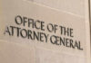 Prosecutor Ousted Over Jaw-Dropping Allegations Office of the Attorney General building sign.
