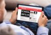 Person reading news website on tablet