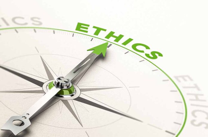 Compass pointing towards the word "Ethics".